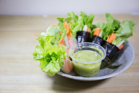 Fresh vegetable salad rolls with sea food saurce.の写真素材