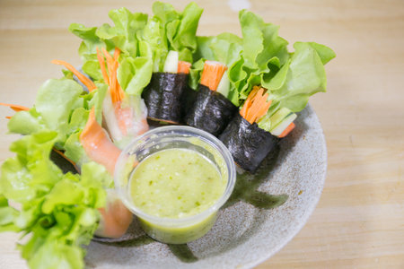 Fresh vegetable salad rolls with sea food saurce.の写真素材