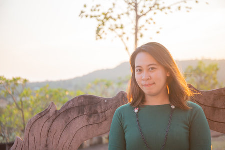 asian women is smile on the sunset.の写真素材