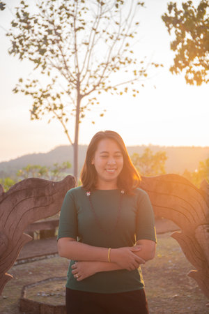 asian women is smile on the sunset.の写真素材