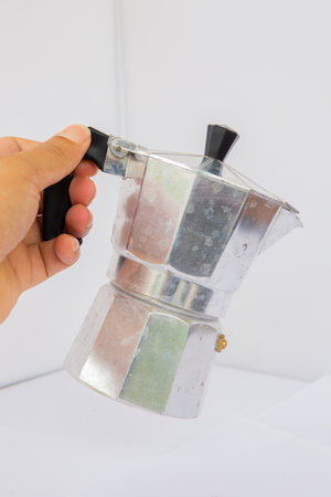 The Moka Pot is a stovetop coffee maker used to make espresso-like coffeeの写真素材