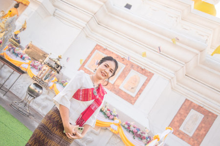Women in northeastern Thailand wearing traditional costumes on important occasions.