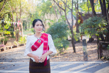 Women in northeastern Thailand wearing traditional costumes.の写真素材