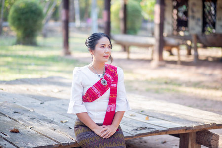 Women in northeastern Thailand wearing traditional costumes on important occasions.