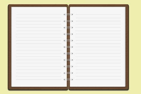 Brown cover notebook on color backgroundの写真素材