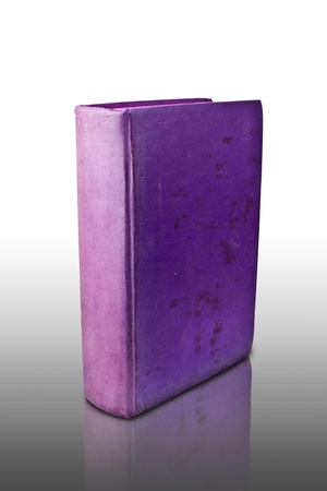 Purple cover, old book on reflected floor の写真素材