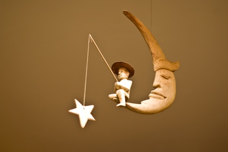 Man fishing the star on the moon, Toy mobileの写真素材