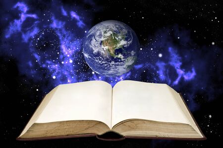 Old book with the earth in space area (Clouds&Topography maps come from httpvisibleearth.nasa.gov)の写真素材