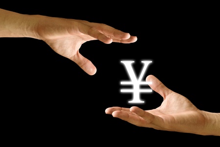 Seller hand  take Yen icon with the buyer hand, Conceptの写真素材