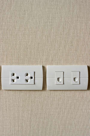 Electricity plug and Phone outletの写真素材