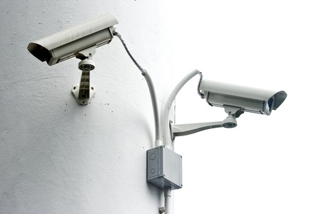 Surveillance camera on white column, Security cameraの写真素材