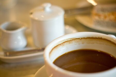 Stain in coffee cup in the morning with sanwich background
