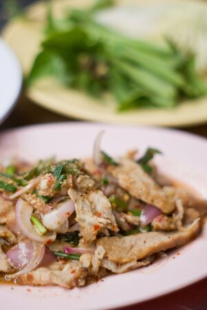 Spicy minced pork with vegetable background, Thai foodの写真素材