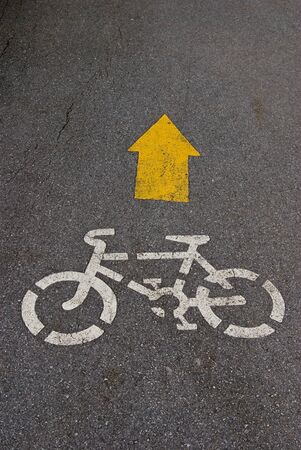Bike way sign on the road in the parkの写真素材