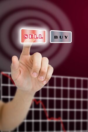Hand pushing sell button with crisis stock market graph, Stock market conceptの写真素材