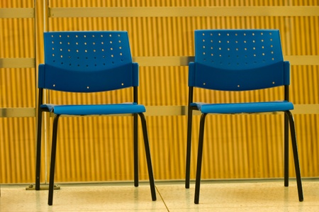 Blue chairs in the buildingの写真素材