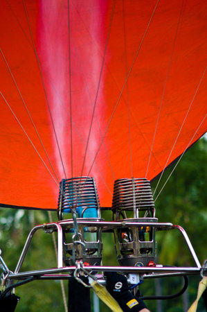 CHIANG MAI, THAILAND - NOV 25 : Unidentified man to prepare the faucet of gas in balloon on Nov 25, 2011 at Prince Royal's College in Chiang Mai, Thailand International Balloon Festival 2011のeditorial素材