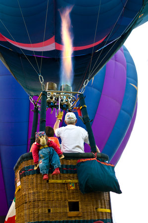 CHIANG MAI, THAILAND - NOV 26 : Participants blow up their balloons in the International Balloon Festival on November 26,2011 at the Prince Royals College in Chiang Mai Thailand.のeditorial素材
