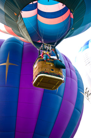 CHIANG MAI, THAILAND - NOVEMBER 26: Hot air balloons flying to the sky in Thailand International Balloon Festival 2011 at Chiang mai, Thailand on November 26, 2011.のeditorial素材