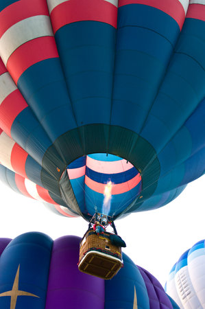 CHIANG MAI, THAILAND - NOVEMBER 26: Hot air balloons flying to the sky in Thailand International Balloon Festival 2011 at Chiang mai, Thailand on November 26, 2011.のeditorial素材
