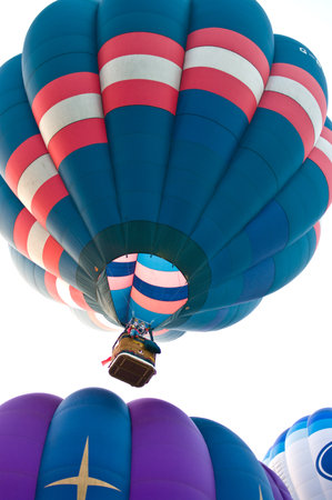 CHIANG MAI, THAILAND - NOVEMBER 26: Hot air balloons flying to the sky in Thailand International Balloon Festival 2011 at Chiang mai, Thailand on November 26, 2011.のeditorial素材