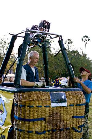 CHIANG MAI, THAILAND - NOV 26 : Unidentified man prepare balloon during Thailand balloon festival 2011 at Prince Royal college in Chiang Mai, Thailand on Nov 26, 2011.のeditorial素材