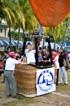 CHIANG MAI, THAILAND - NOV 26 : Participants blow up their balloons in the International Balloon Festival on November 26,2011 at the Prince Royals College in Chiang Mai Thailand.のeditorial素材