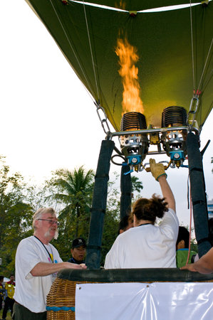 CHIANG MAI, THAILAND - NOV 26 : Participants blow up their balloons in the International Balloon Festival on November 26,2011 at the Prince Royals College in Chiang Mai Thailand.のeditorial素材