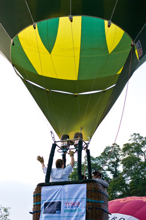 CHIANG MAI, THAILAND - NOV 26 : Participants blow up their balloons in the International Balloon Festival on November 26,2011 at the Prince Royals College in Chiang Mai Thailand.のeditorial素材