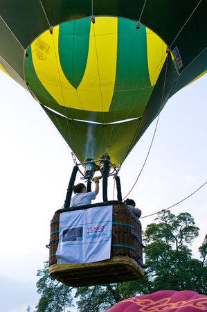 CHIANG MAI, THAILAND - NOV 26 : Participants blow up their balloons in the International Balloon Festival on November 26,2011 at the Prince Royals College in Chiang Mai Thailand.のeditorial素材