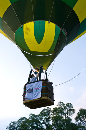 CHIANG MAI, THAILAND - NOV 26 : Participants blow up their balloons in the International Balloon Festival on November 26,2011 at the Prince Royals College in Chiang Mai Thailand.のeditorial素材