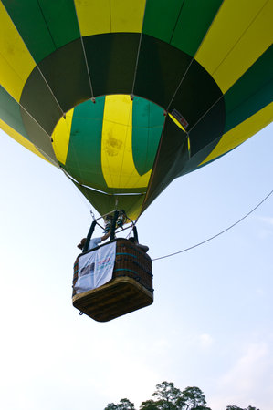 CHIANG MAI, THAILAND - NOV 26 : Participants blow up their balloons in the International Balloon Festival on November 26,2011 at the Prince Royals College in Chiang Mai Thailand.のeditorial素材