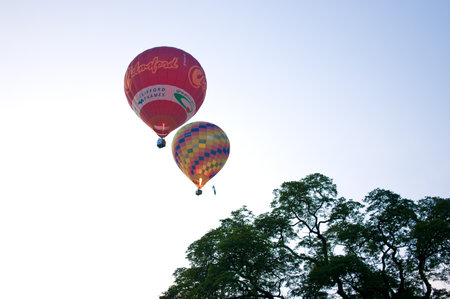 CHIANG MAI, THAILAND - NOV 26 : Balloon floating to sky during Thailand interantional balloon festival 2011 at Prince Royal's college in Chiang Mai, Thailand on Nov 26, 2011.のeditorial素材