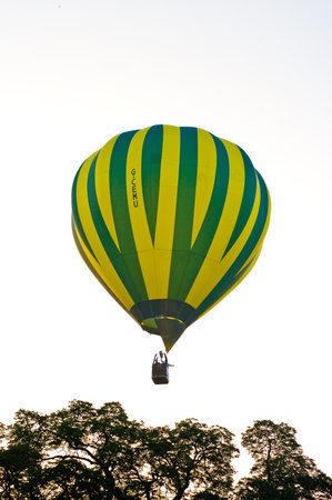 CHIANG MAI, THAILAND - NOV 27 : Balloon floating to sky during Thailand interantional balloon festival 2011 at Prince Royal's college in Chiang Mai, Thailand on Nov 27, 2011.のeditorial素材