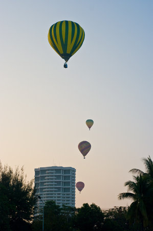 CHIANG MAI, THAILAND - NOV 27 : Balloon floating to sky over city during Thailand interantional balloon festival 2011 at Prince Royal's college in Chiang Mai, Thailand on Nov 27, 2011.のeditorial素材