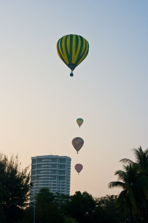 CHIANG MAI, THAILAND - NOV 27 : Balloon floating to sky over city during Thailand interantional balloon festival 2011 at Prince Royal's college in Chiang Mai, Thailand on Nov 27, 2011.のeditorial素材
