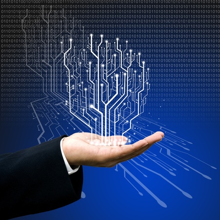Circuit board graphic line on hand ,Technology background の写真素材