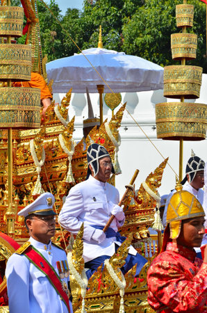 Bangkok, Thailand - April 9 : Vintage soldiercarry sword beside Racharot Noi with soldiers marching on April 9, 2012  in The Royal Funeral of HRH Princess Bejaratana Rajasuda of Thailandのeditorial素材