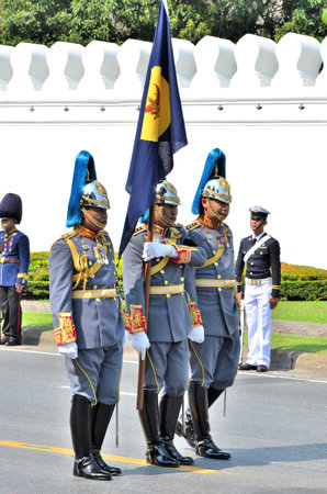 BANGKOK, THAILAND - APRIL 9 : Cavalryman carry flag marching  on April 9, 2012  in The Royal Funeral of HRH Princess Bejaratana Rajasuda of Thailandのeditorial素材