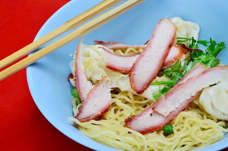 Egg noodle with red pork and dumpling, Thai foodの写真素材
