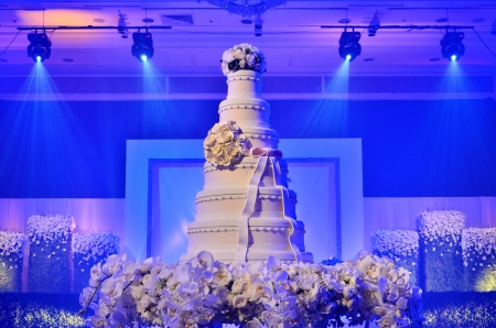 Wedding cake with stage lighting in wedding ceremonyの写真素材
