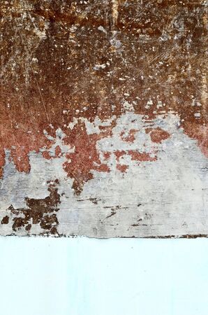 Scratch on steel wall with old paintedの写真素材