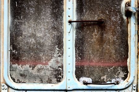 Old grunge wall on train with rust and scratch backgroundの写真素材
