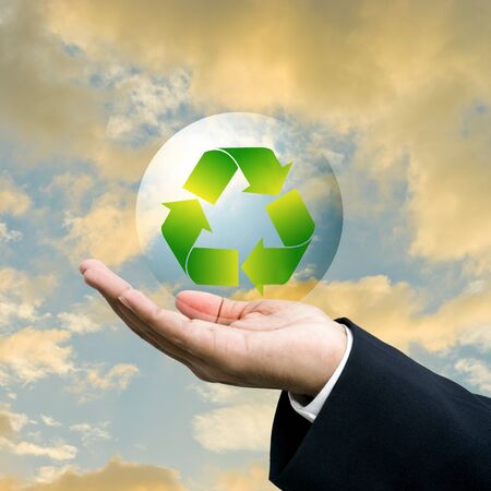 Businessman carry the bubbles recycle symbolの写真素材