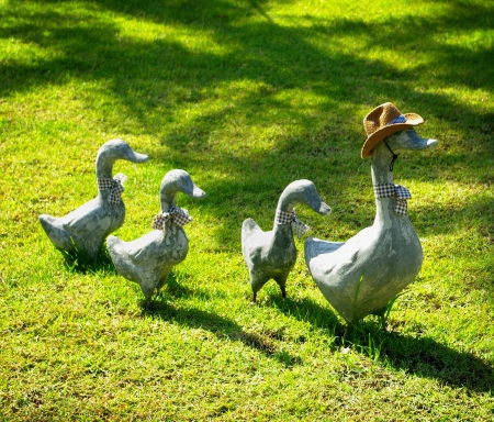 Duck sculpture on green field for decorate gardenの写真素材