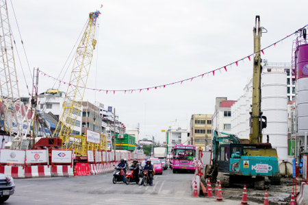 BANGKOK, THAILAND - AUGUST 31 : Machinery working for build subway station on 31 August 2012 at Wang-Burapa junction, Bangkok, Thailandのeditorial素材