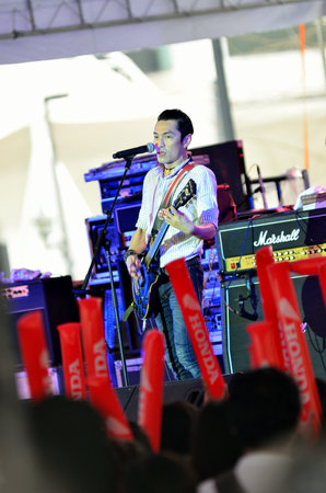 BANGKOK, THAILAND - SEPTEMBER 15 : Pu singer of Blackhead bandwith his band show in Celebrate of Channel [V] Thailand sixteen anniversary on 15 September 2012 at Central World, Bangkokのeditorial素材