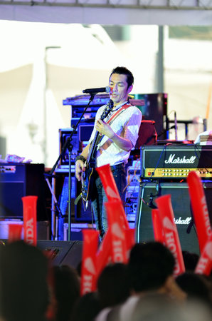 BANGKOK, THAILAND - SEPTEMBER 15 : Pu singer of Blackhead bandwith his band show in Celebrate of Channel [V] Thailand sixteen anniversary on 15 September 2012 at Central World, Bangkokのeditorial素材