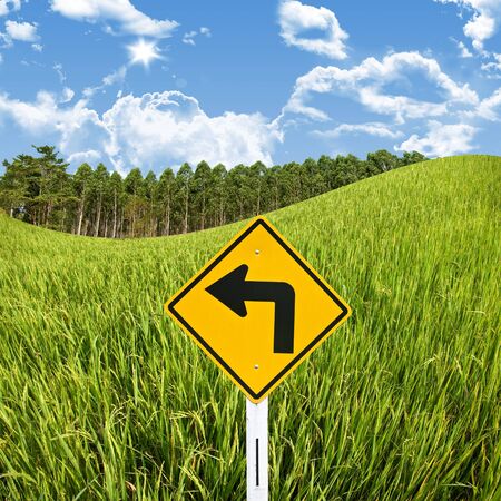  Turn left sign with rice field, Travel in countryside conceptの写真素材