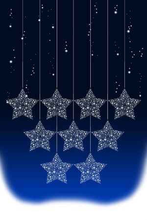 Hanging Christmas star with snow backgroundの写真素材